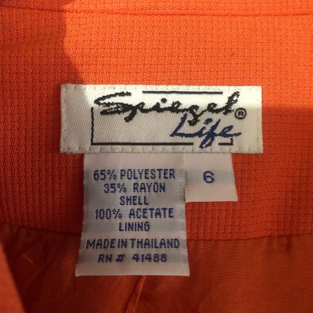 Orange suit, jacket/skirt. Excellent condition